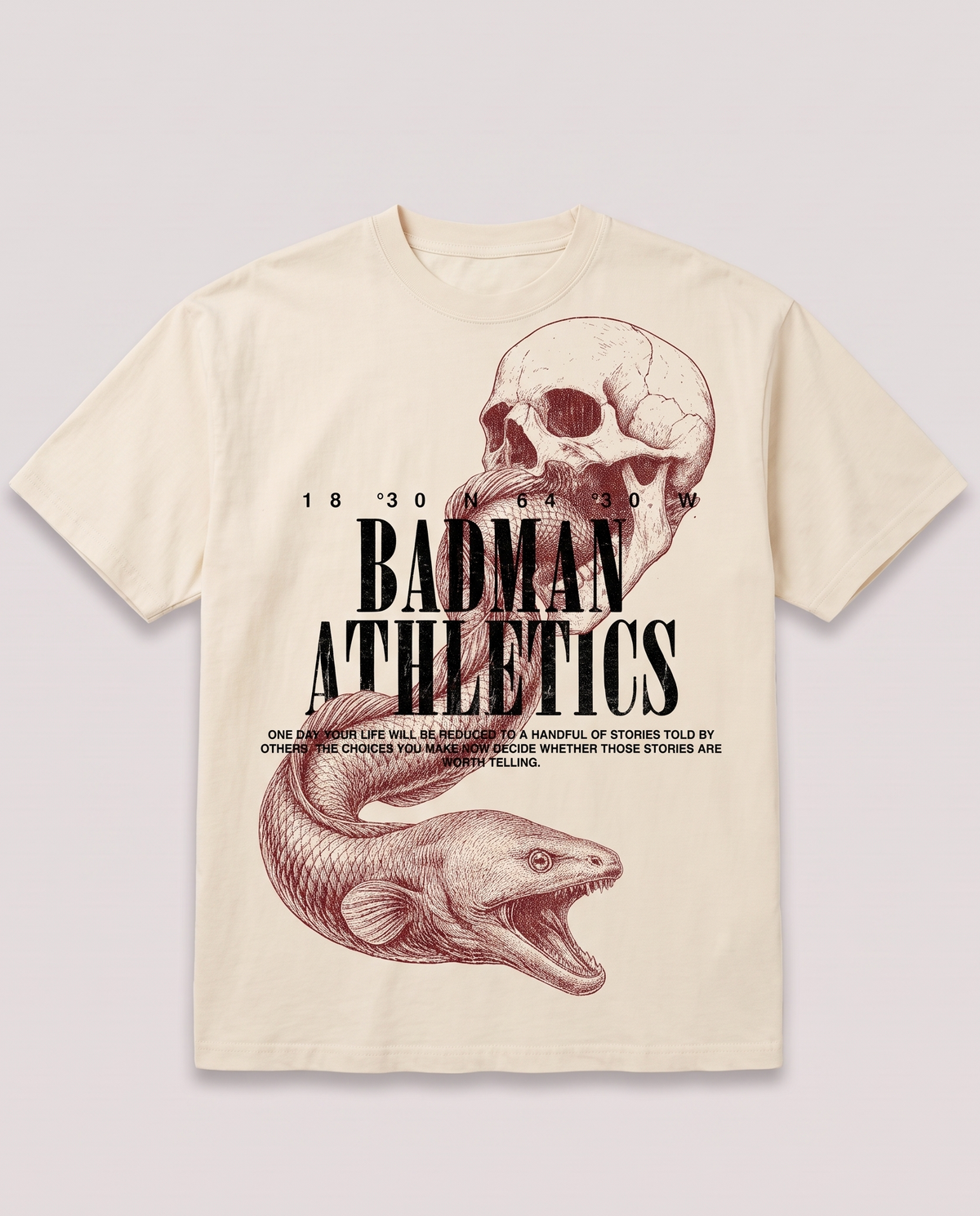 An off-white short-sleeve t-shirt with a graphic print featuring a skull, an eel, and the text 'BADMAN ATHLETICS' in black and dusty red, displayed flat against a light gray background.